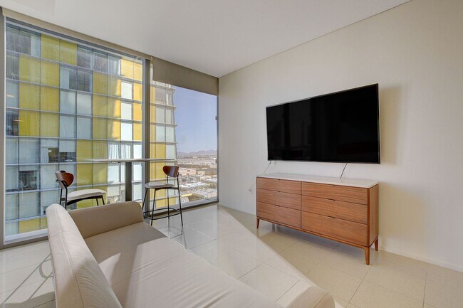 Building Photo - Stunning Strip Views from this Fully Furnished Studio Residence.