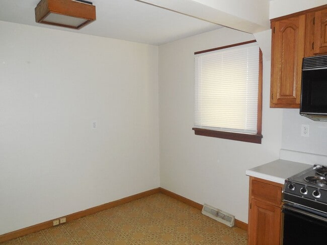 Building Photo - Two Bedroom House with Drive Under Garage!