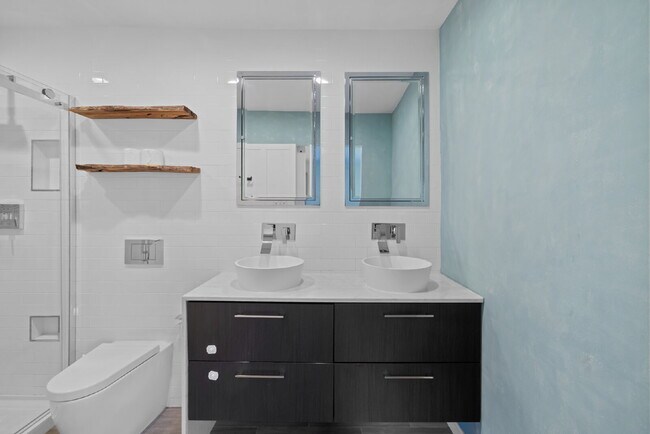 Building Photo - Completely Renovated Corner Townhome with Modern Kitchen, Designer Baths, and Private Yard