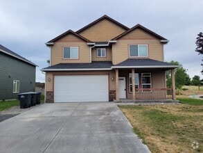 Building Photo - 4-Bedroom House