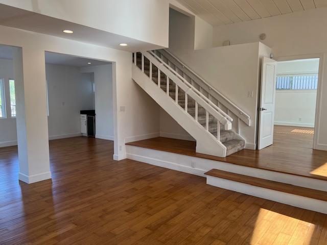 Living room, Den/TV room, staircase to upstairs bedrooms - 2812 Anchor Ave