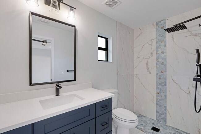 Building Photo - 2023 Duplex All tiled - 3 Bedroom Plus Den/2 Bath & 2 car Garage