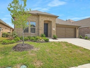 Building Photo - Upgrades galore and ready Now!