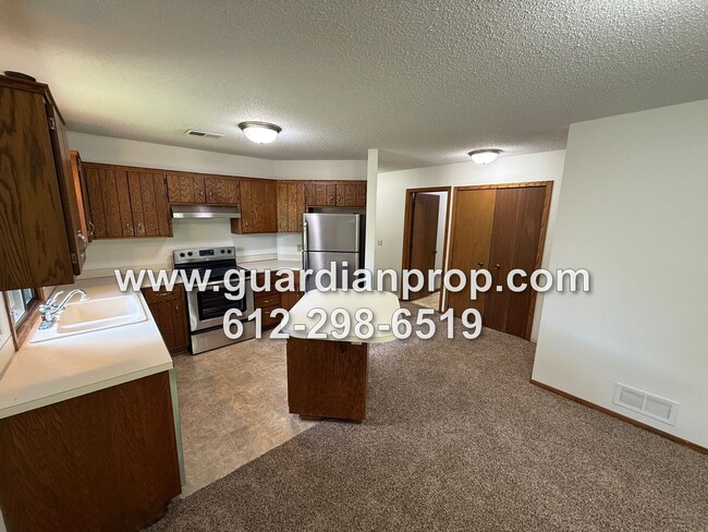 Building Photo - One Level End Unit Townhouse Available Now...