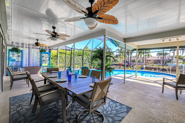 Building Photo - Furnished 4BR Waterfront Pool Home in Cape...