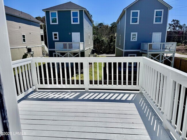 Building Photo - 23 Island Breeze Ln