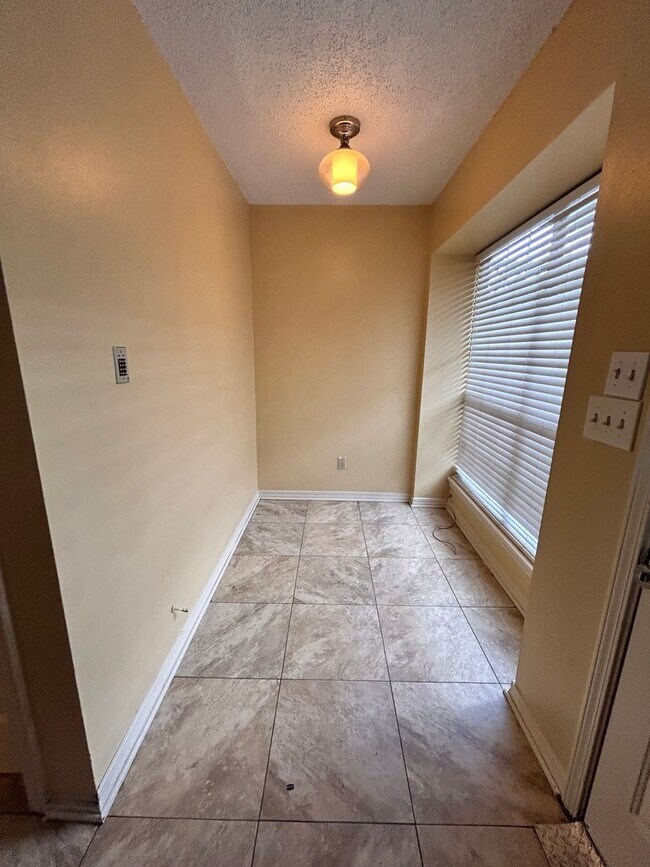 Building Photo - W/S/T included! Dbl garage! 2BR/2.5BA with...