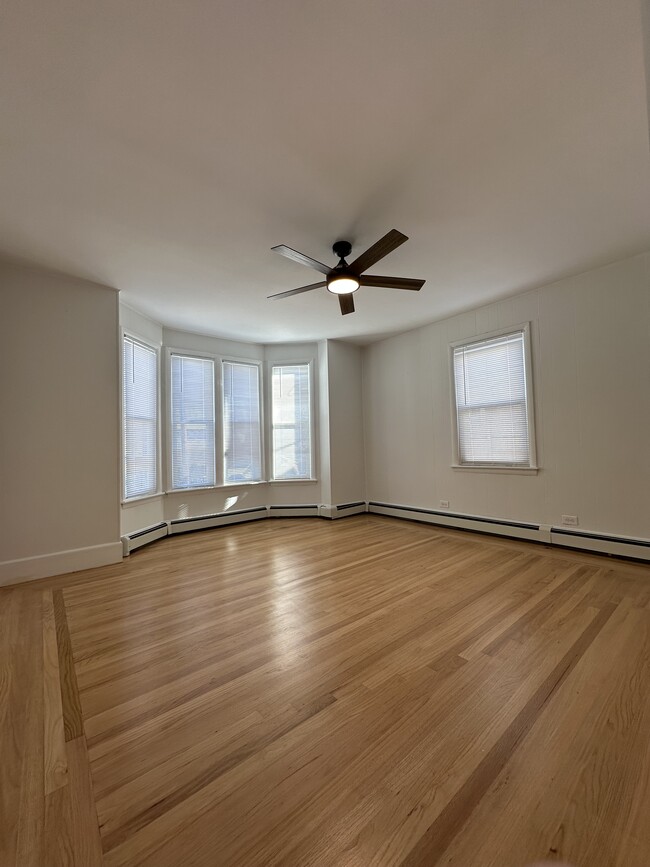 Spacious family/living room with a tone of natural sunlight - 12 Tiffany St