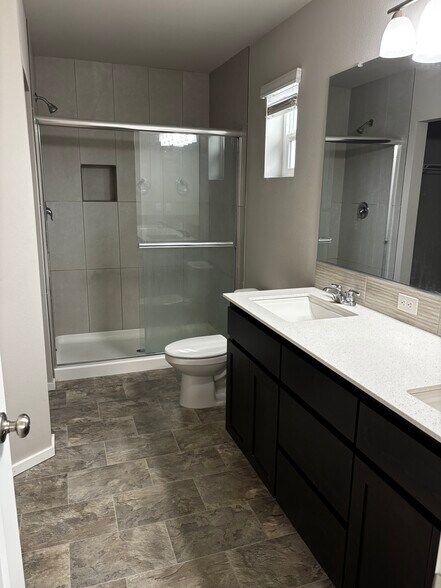 Primary suite double vanity and shower - 20556 SE Evian Ave
