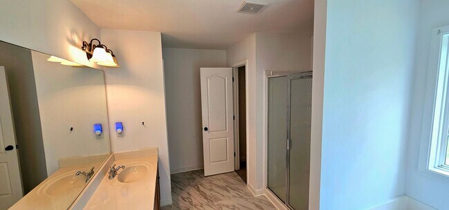 Building Photo - Commanding Curb Appeal, Conveniently Place