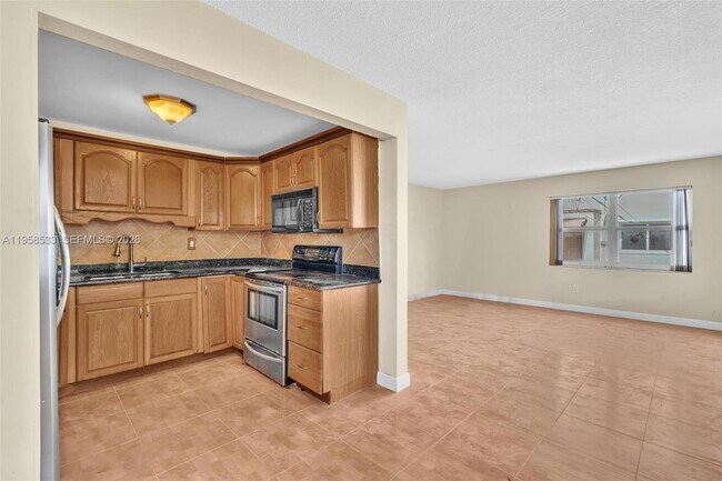 Building Photo - 3660 SW 60th Ave