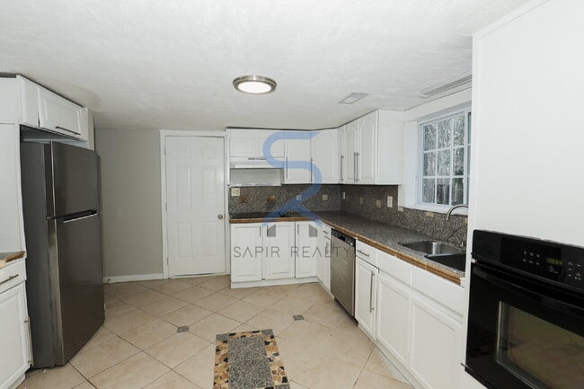 Building Photo - Move in before January 15th and choose your reward: a $250 Amazon Gift Card or a 55 Smart TV!