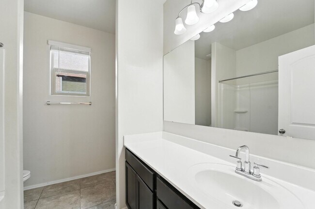 Building Photo - Rare Find! Spacious 3-Bed, 2-Bath + 3-Car ...