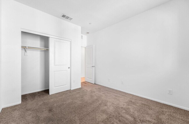 Building Photo - Modern Cadence Townhome with Open-Concept Living & Energy-Efficient Features!