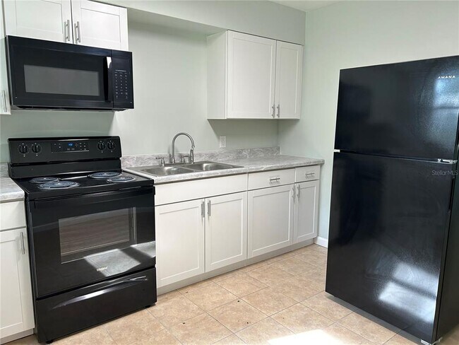 Building Photo - 1639-1643 NE 16th Ave