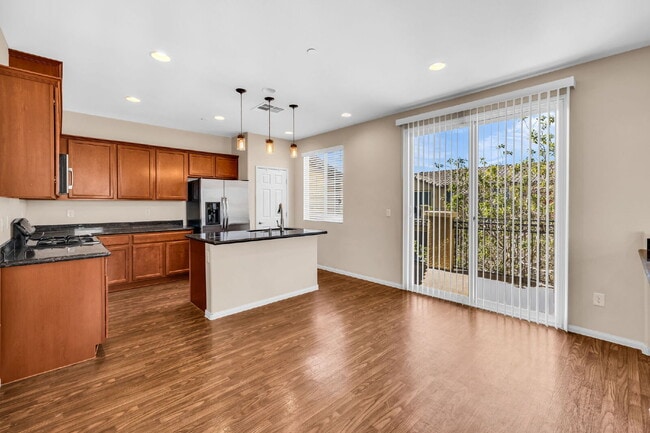 Building Photo - Modern, Guard Gated, and Close to Everything! 3-Bed Townhome Near St. Rose Parkway and Liberty Hi...