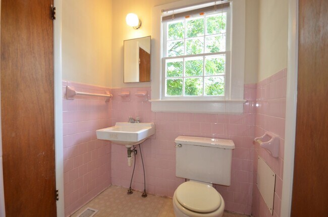 Building Photo - Charming 2-Bedroom, 2-Bath Single-Family Home with Sunroom & Wooded Views