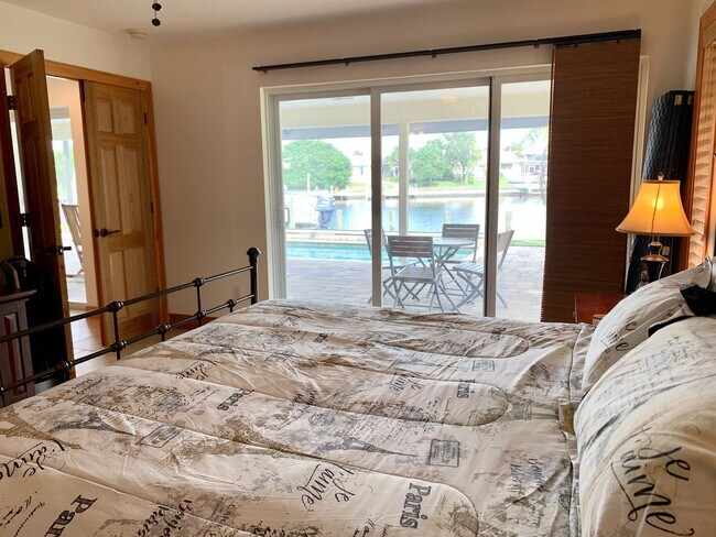 Building Photo - AVAILABLE 2027 SEASON! ! PGI HEATED POOL, WATERFRONT, BOAT LIFT