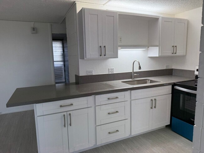 Building Photo - Sunset Lakeview - Fully renovated 3 bedroom, 2 bath with One open parking