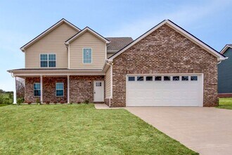 Building Photo - Spacious 4 Bedroom Home with Open Floor Plan - Free Rent!