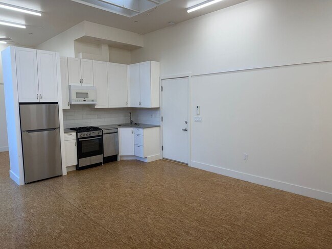 Building Photo - Bright Live-Work Studio with Deck & Tall Ceilings off Lowell Street in Oakland