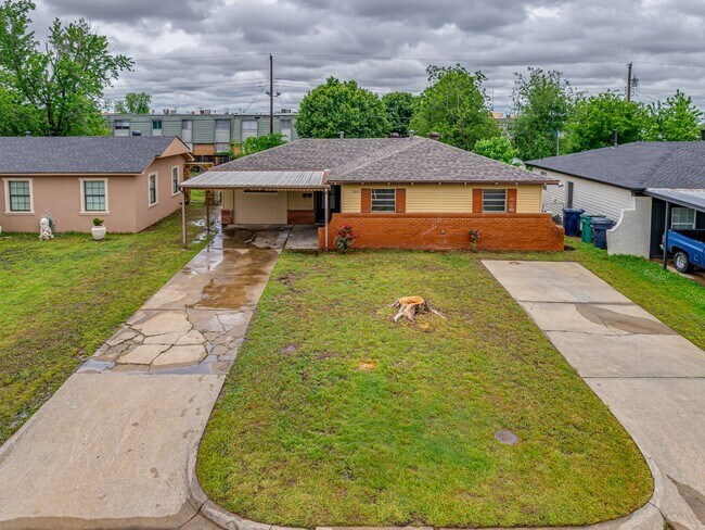 Building Photo - Charming Home in OKC + 4 bedrooms