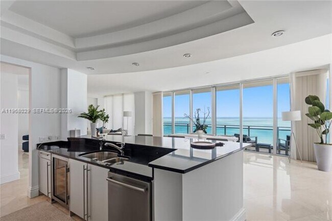 Building Photo - 10295 Collins Ave