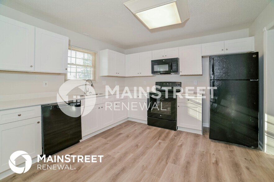 Building Photo - 7208 Deville Way