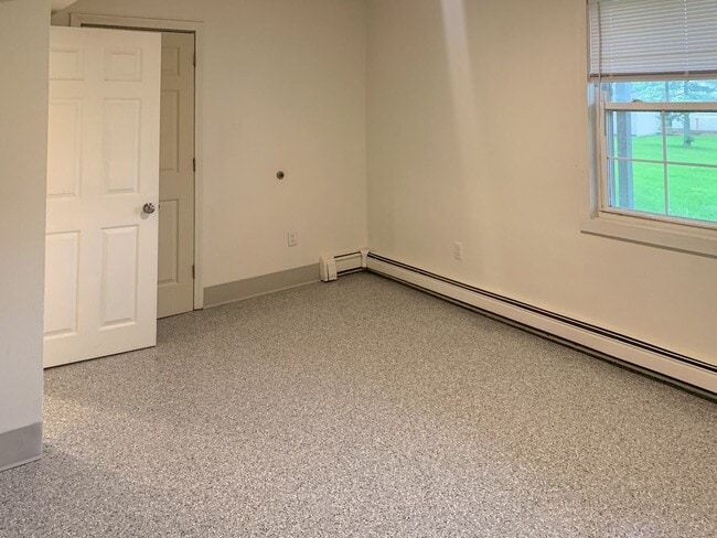 Building Photo - Spacious 3-Bedroom Apartment Near UVM with Private Entrance & Parking