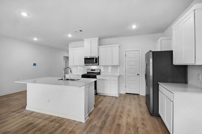 Building Photo - Stunning New 4-Bedroom Home with Modern Up...