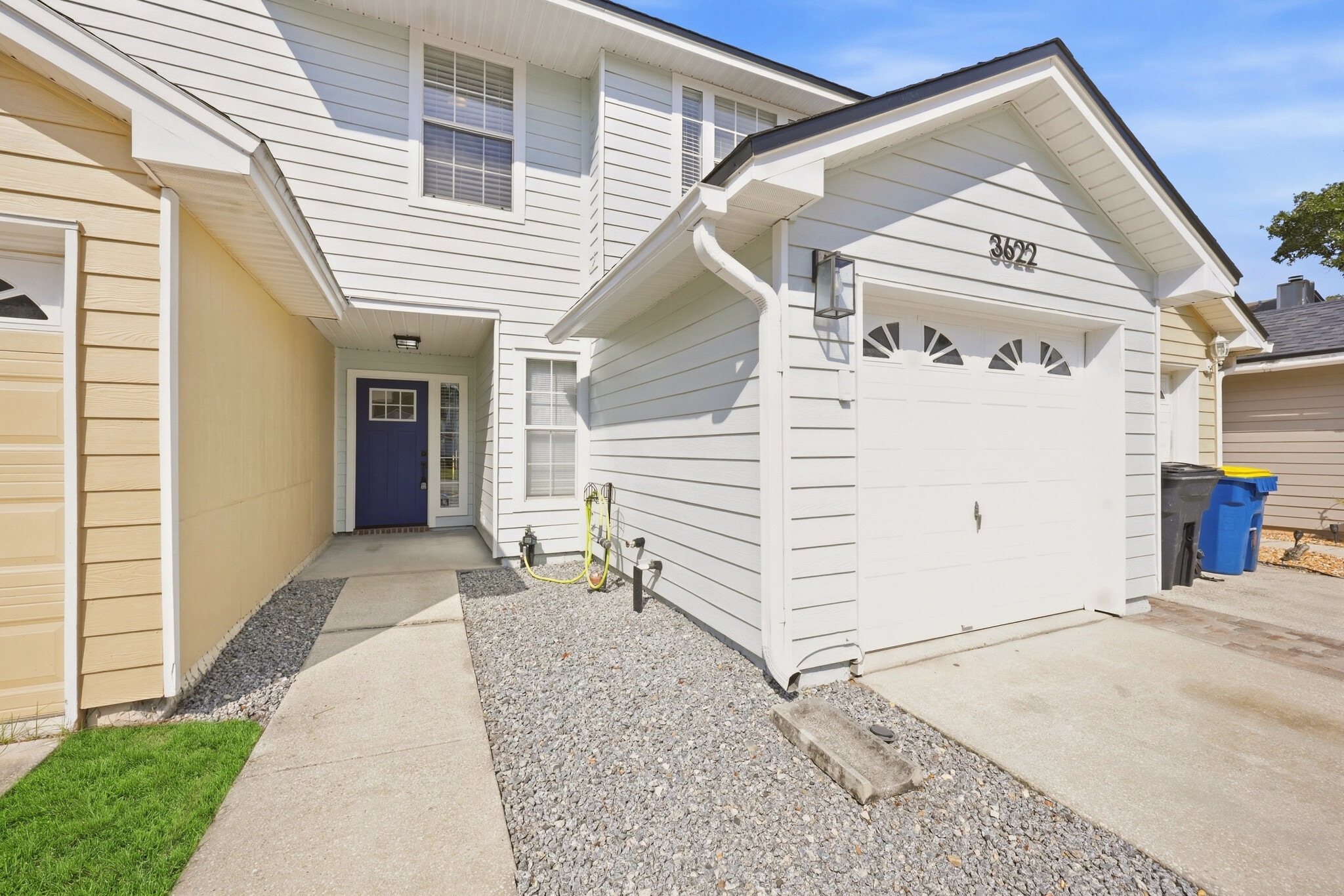 Attached one-car garage and covered entry at 3622 Caroline Vale Blvd. - 3622 Caroline Vale Blvd