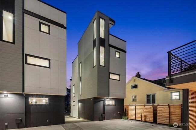Building Photo - Welcome Home -Modern and Expansive Windows