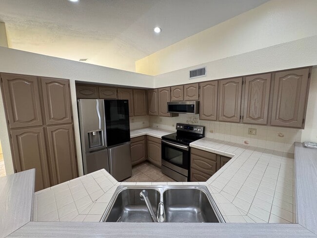 Building Photo - 3BR/2BA/2CG, 1836 sq.ft. rental with POOL ...