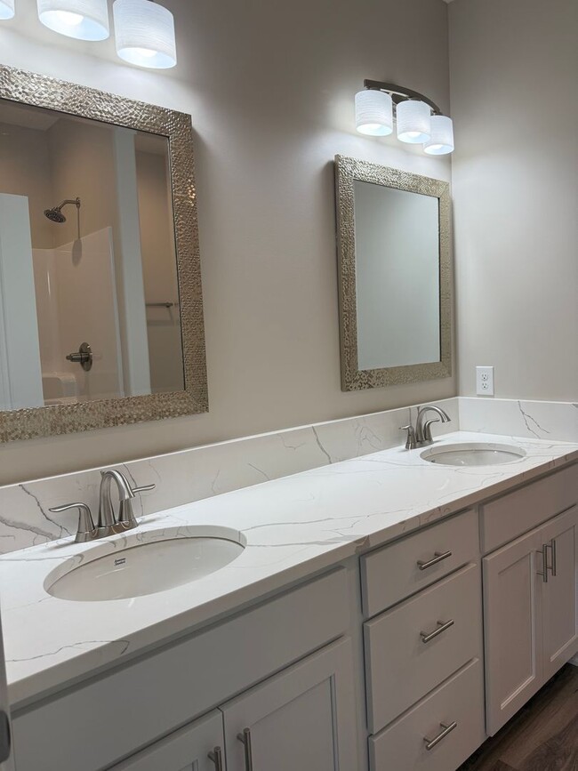 Building Photo - Ranch townhome with 2 stall garage. Spacio...