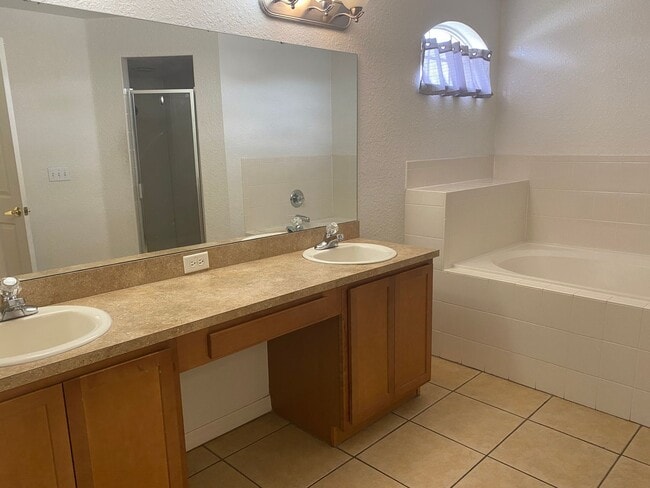 Building Photo - Now Available: 4BR/2BA Modern Home