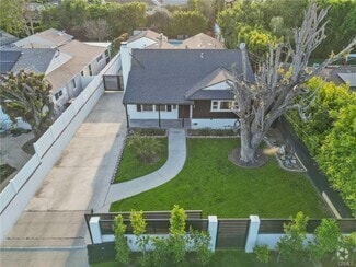 Building Photo - 5937 Ranchito Ave