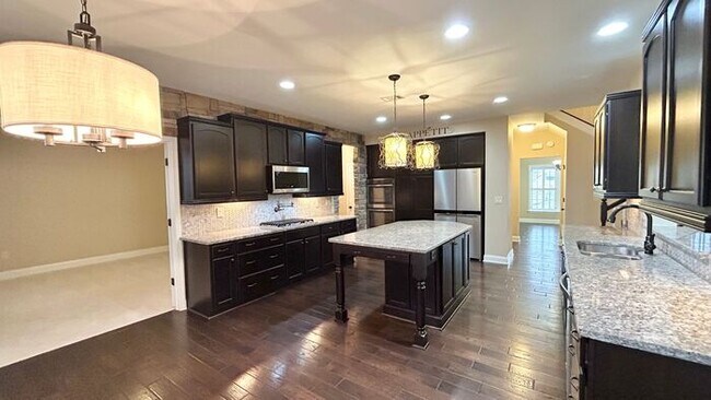 Building Photo - Stunning Cumming Executive Home, Hand Scraped Hardwoods, Custom Upgrades!