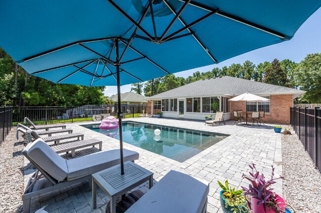 Building Photo - "Coastal Elegance Awaits: Spacious 4-Bed Oasis with Granite Touches on Shipwreck Road"