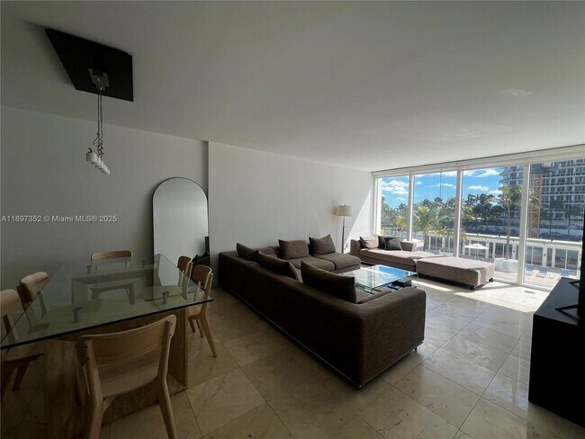 Building Photo - 10275 Collins Ave