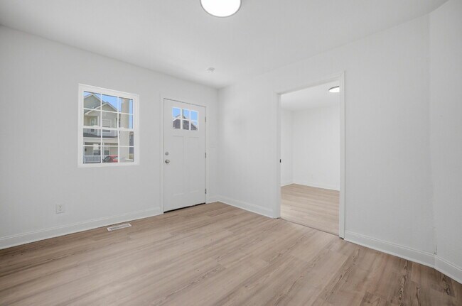 Building Photo - NEWLY REMODELED 4 BEDROOM COLONIAL HOME FOR RENT IN SUFFOLK!