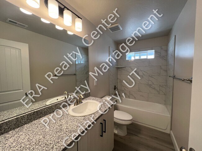 Building Photo - 3 Bed - 2.5 Bath, New Construction, Large Condo - 2 Car Garage
