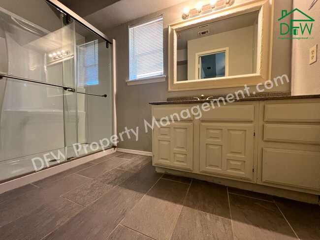 Building Photo - Charming Single-Story 2/2 Duplex with 2-Car Garage Just Steps from Your Back Door – Arlington, TX