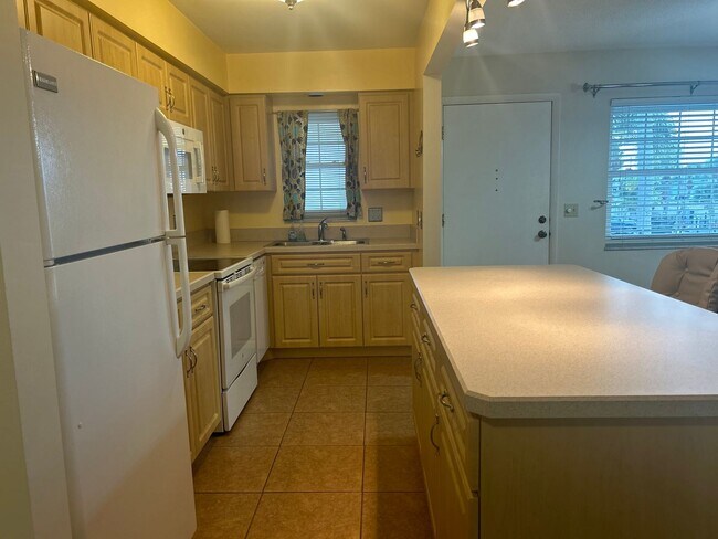 Building Photo - Discover Coastal Bliss: Your Ideal Beachsi...