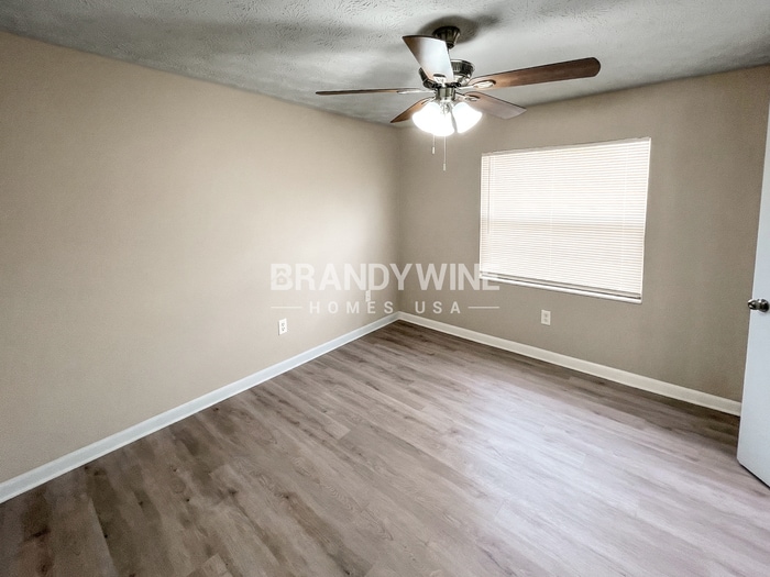 Building Photo - 8409 Red Holly Ln