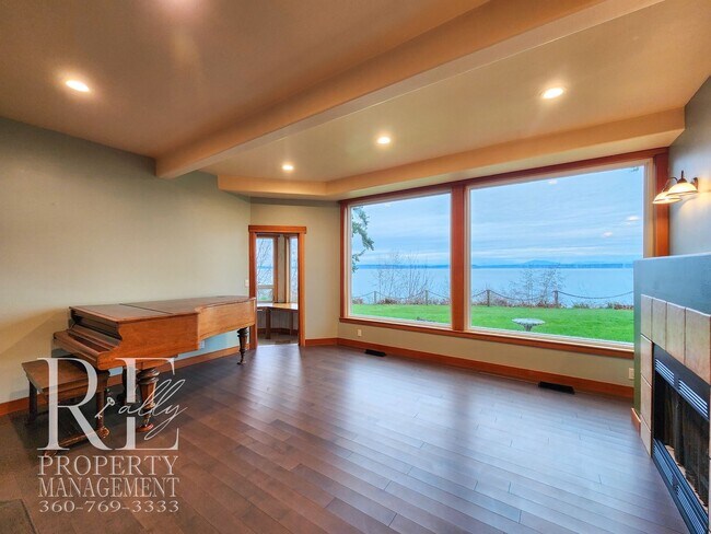 Building Photo - MOVE-IN SPECIAL: 50% OFF FIRST MONTHS RENT - Waterfront Rustic Retreat with Vaulted Ceilings, Pic...