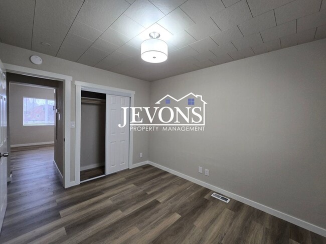 Building Photo - 3 bedroom home with washer and dryer – 1-acre lot next to an orchard – Large and small pets allowed!