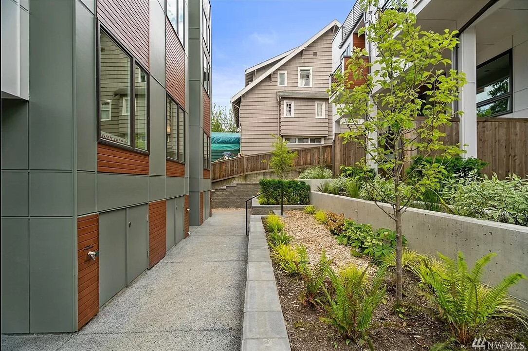 Walkway to unit & the exterior storage (comes with each unit) - 9268 50th Ave S
