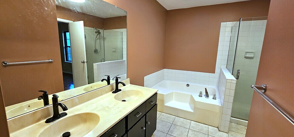 ull Bath — Double Vanity | Standout full bath: twin sinks with matte-black fixtures - 43 Tynemouth Ct