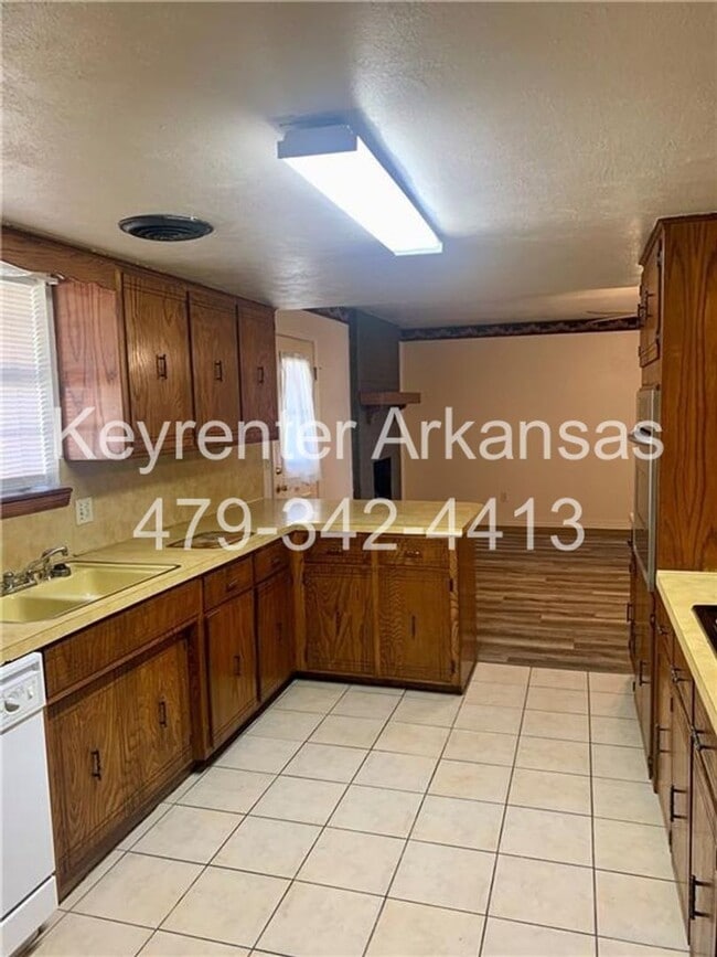 Building Photo - Charming Home with Open Kitchen, Fireplace & 2-Car Garage