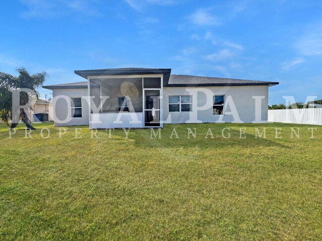 Building Photo - 3BR/2BA Home Ready to Bloom in Lehigh Acres. Garage + Spring Savings Included!